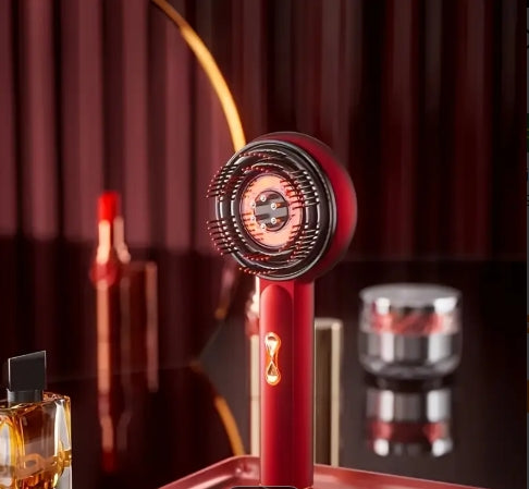 Red hair dryer with a blurred background